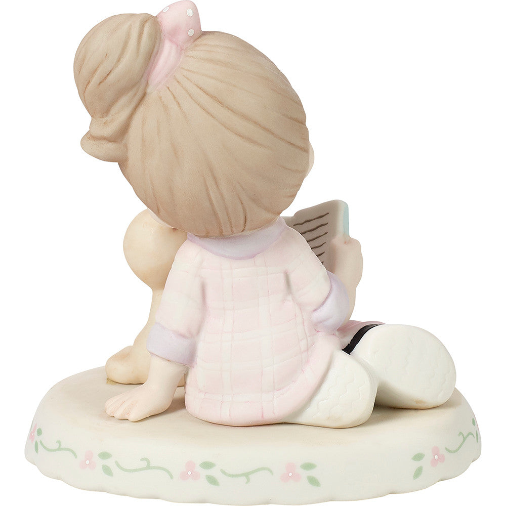 Brunette haired girl with cat reading book with age 13 on the base - back view