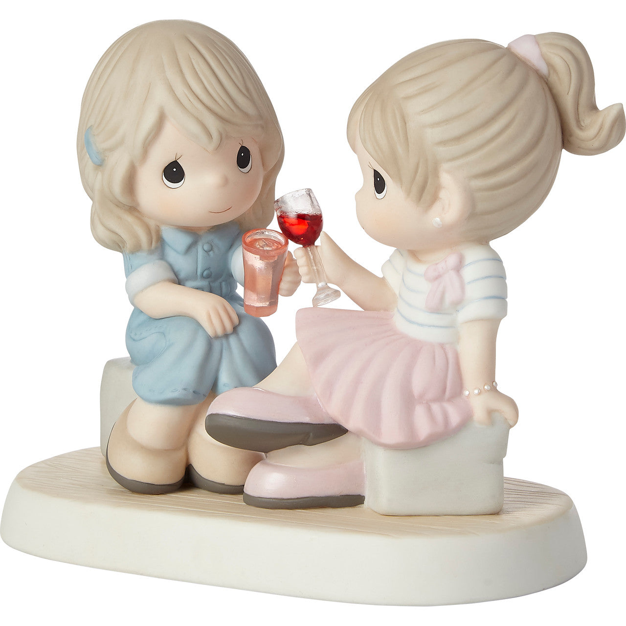 Two friends talking and toasting their friendship - side view