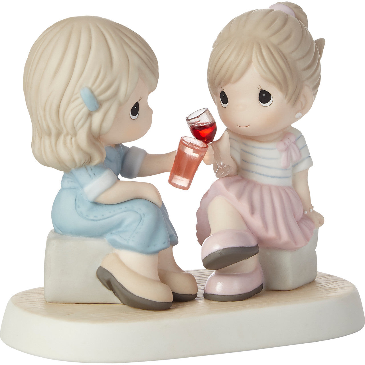 Two friends talking and toasting their friendship - side view