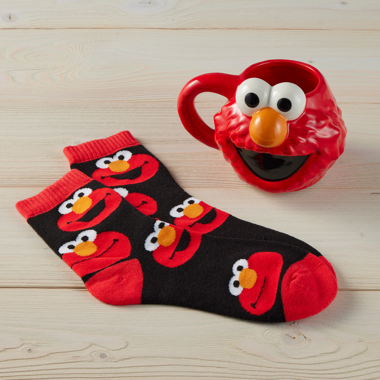 Precious Moments 237404 Sesame Street Elmo Faces Mug and Socks Set