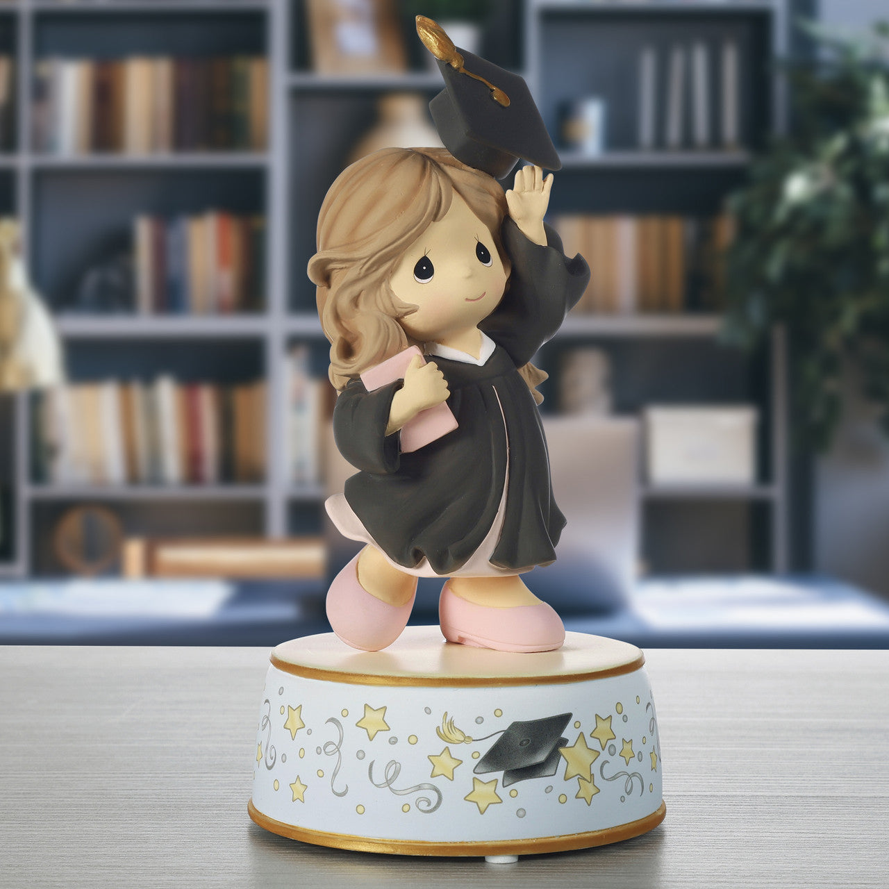 From Cap And Gown To New Horizons Brunette Girl/Black Gown Graduation Musical - Image