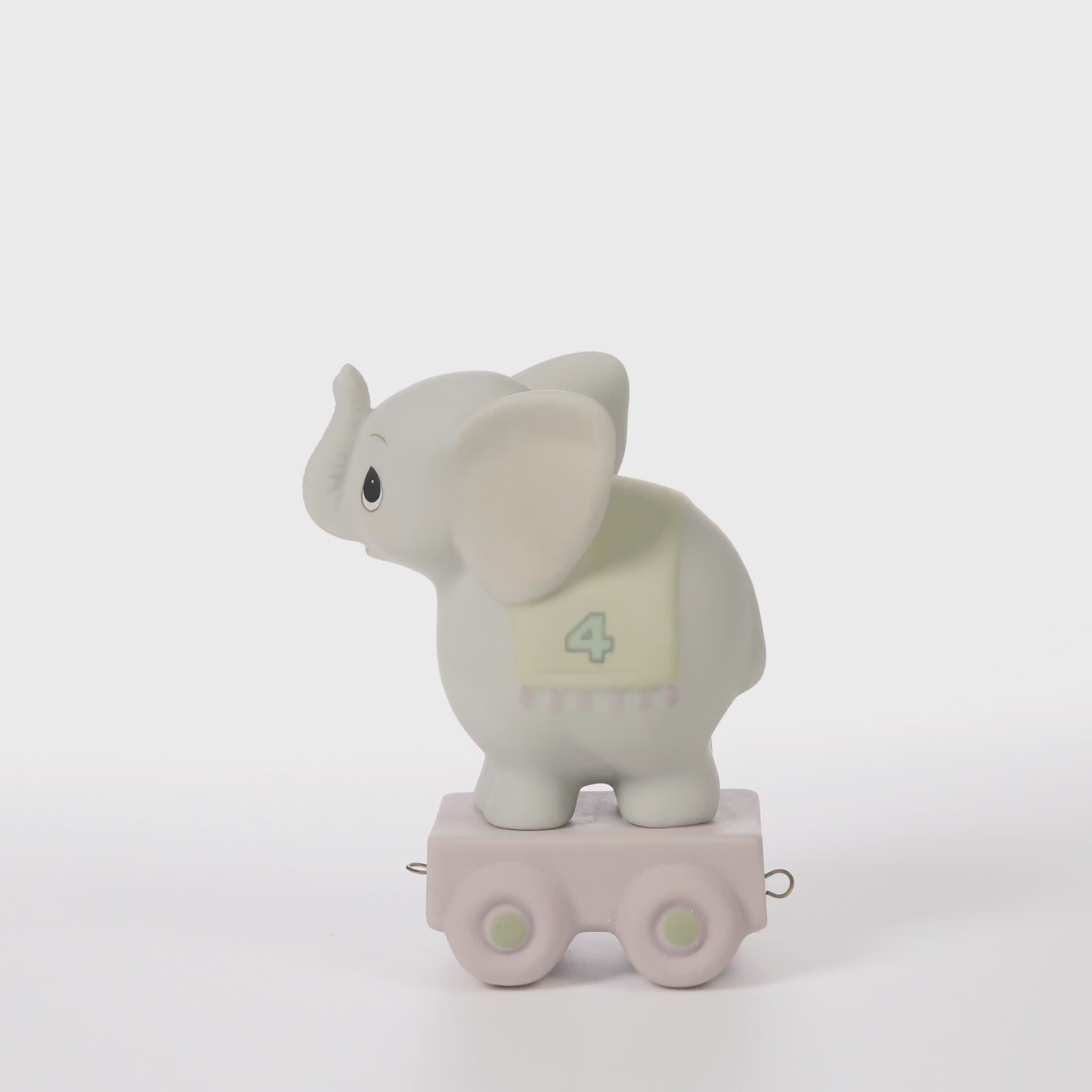 Grey elephant on platform with age 4 on blanket over back - 360 video