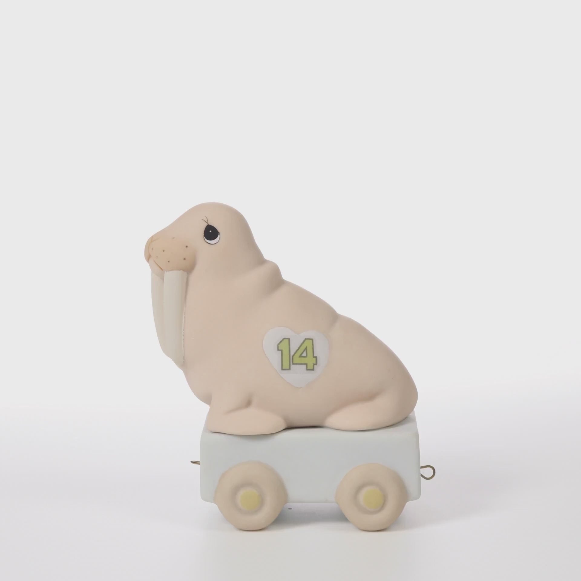 Pink walrus on platform with age 14 on the side - 360 video
